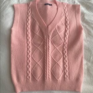 pink sweater vest
